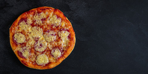 salami pizza with cheese (dough, tomato sauce and other ingredients) menu concept. food background. top view. copy space