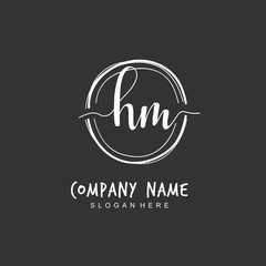 Handwritten initial letter H M HM for identity and logo. Vector logo template with handwriting and signature style.