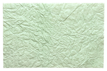 Isolated crumpled sheet paper in excellent light green color for design work.