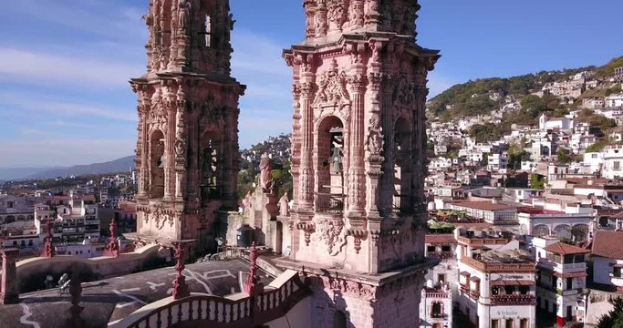 Taxco, Church of Santa Prisca in Mexico by drone on a sunny day.