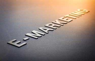 Fototapeta premium Word e-marketing written with white solid letters