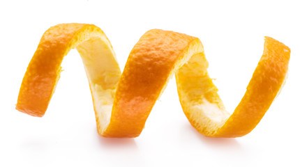 Orange peel or orange twist on white background. Close-up.