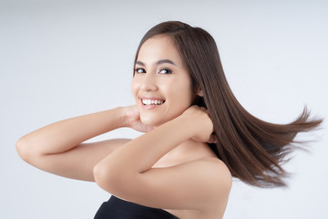 Fototapeta premium Asian woman, she is happy with her hair.