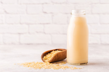 A bottle of rice milk and rice.