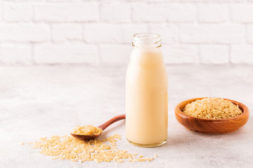 A bottle of rice milk and rice.