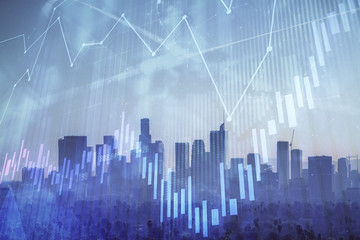 Forex chart on cityscape with skyscrapers wallpaper double exposure. Financial research concept.