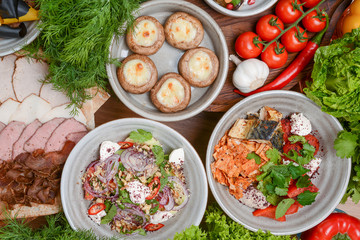 Top view of traditional Georgian cuisine: Kolkh and Adjara khachapuri, khinkali dumplings, shotis puri, kubdari or kubed