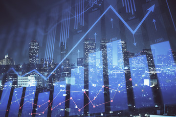 Financial graph on night city scape with tall buildings background multi exposure. Analysis concept.