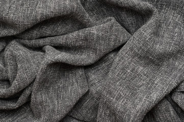 Old blanket made of gray material