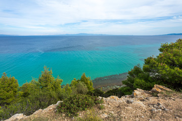Obraz premium Amazing beautiful sea landscape of Greece. View from above at blue transparent sea water. Horizontal color photography.