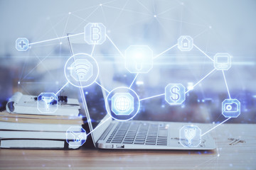 Computer on desktop with social network theme icon. Multi exposure. Concept of international connections.