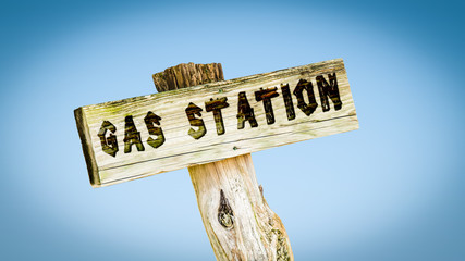 Street Sign to Gas Station