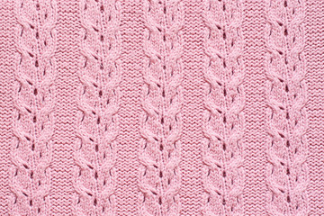Cable lace knitting stitch pattern, soft pink woolen texture, handmade knitted cloth