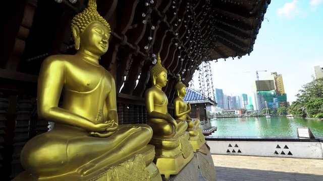 Colombo, Sri Lanka - Golden Buddha statues at Seema Malaka Temple of Gangaramaya Buddhist Complex is a popular tourist spot and location in Colombo Sri Lanka