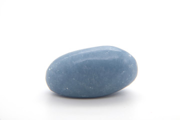 macro mineral anhydrite stone on a white background