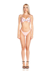 Obraz premium Young woman in bikini, isolated.