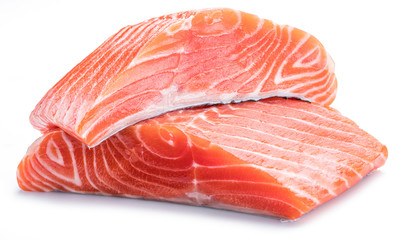 Fresh raw salmon fillets on white background.