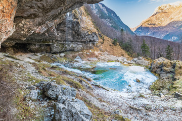 Winter. Ice games in the Fontanon of Goriuda waterfall. Friuli, Italy.