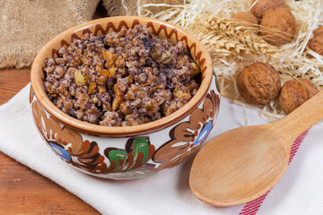 Christmas kutia - Slavic traditional ceremonial grain dish in bowl closeup