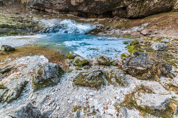 Naklejka na ściany i meble Winter. Ice games in the Fontanon of Goriuda waterfall. Friuli, Italy.
