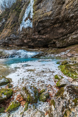Winter. Ice games in the Fontanon of Goriuda waterfall. Friuli, Italy.