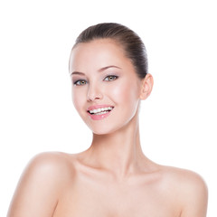Fototapeta premium Beautiful face of smiling woman with clean fresh skin