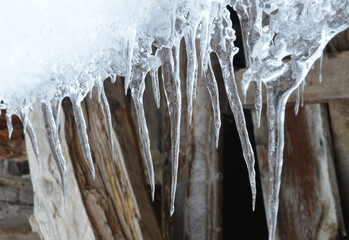 icicles on the roof in winter