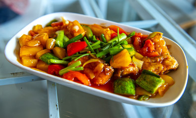 Fried fish and sauce sweet taste sour, fried vegetables and pineapple suitable for eating with rice