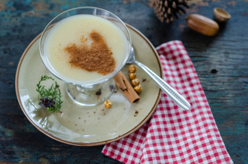 Traditional turkish drink; boza with cinnamon sticks and chickpea