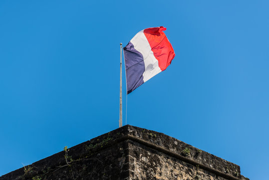 French flag on a top of Fort Saint Louis in Fort-de-France, Martinique