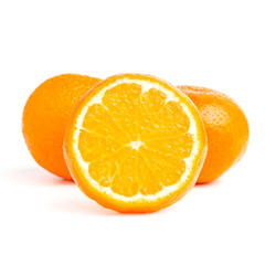 Sliced round halves of orange fruit and whole citrus isolated on white background
