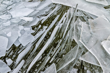 Ice hummocks on the river. A lot of cracked ice