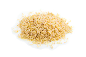 Heap of bulgur isolated on white background. Side view, close up.