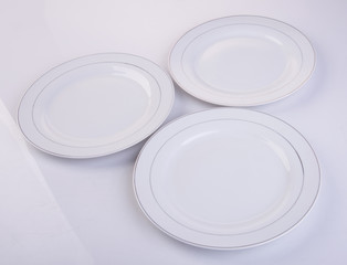 plate or empty plate on a background new.
