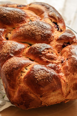 Kozunak traditional Easter bread in Bulgaria. Kozunak is a sweet ritual bread made at home for Easter. In Romania cozonac, Greece Tsoureki, Italy Panettone, France Brioche, Russia kulich. Warm colors