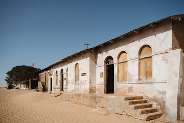 home ruins in the African desert sunk in sand