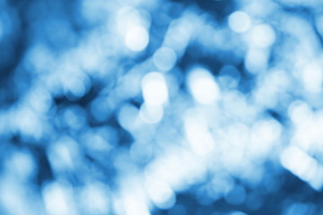 Blue color abstract background with blurred defocus bokeh light