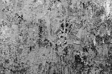 Texture of a concrete wall with cracks and scratches which can be used as a background