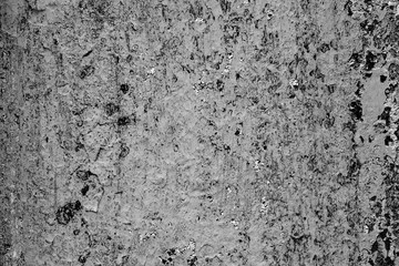 Texture of a concrete wall with cracks and scratches which can be used as a background