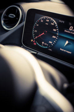 Digital speedometer on a modern car dashboard
