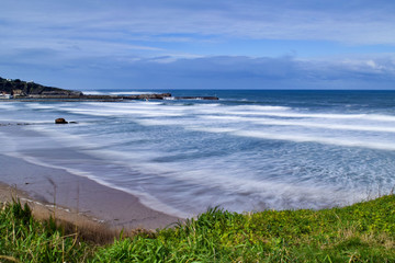 view of beach with sea and blue sky