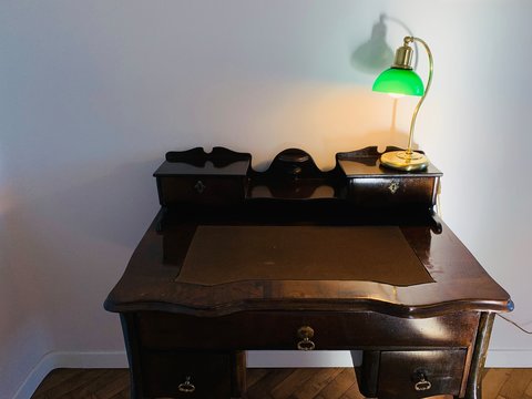 Antique Green Lamp On The Writing Desk