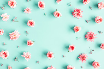 Flowers composition. Rose flowers on blue background. Valentines day, mothers day, womens day concept. Flat lay, top view, copy space