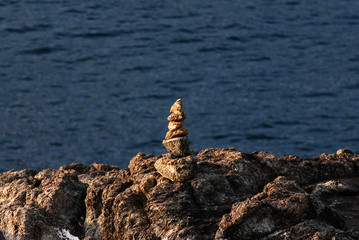 Nature scene of Stone stack on the shore of phuket Thailand.