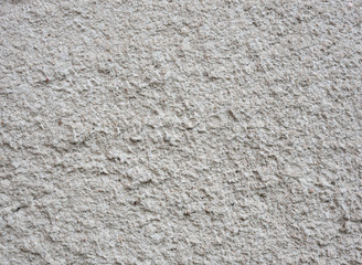 Beautiful gray textured stucco on the wall.