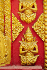 Fototapeta na wymiar Travelling Laos, temple gold decoration 