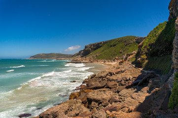 Rugged coastline of Robberg Nature Reserve in South Africa