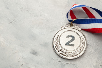 Silver medal. Second place award with ribbon
