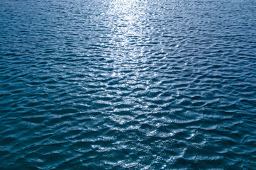 water surface with sun shine reflection