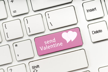 Send Valentine pink key button on white keyboard concept